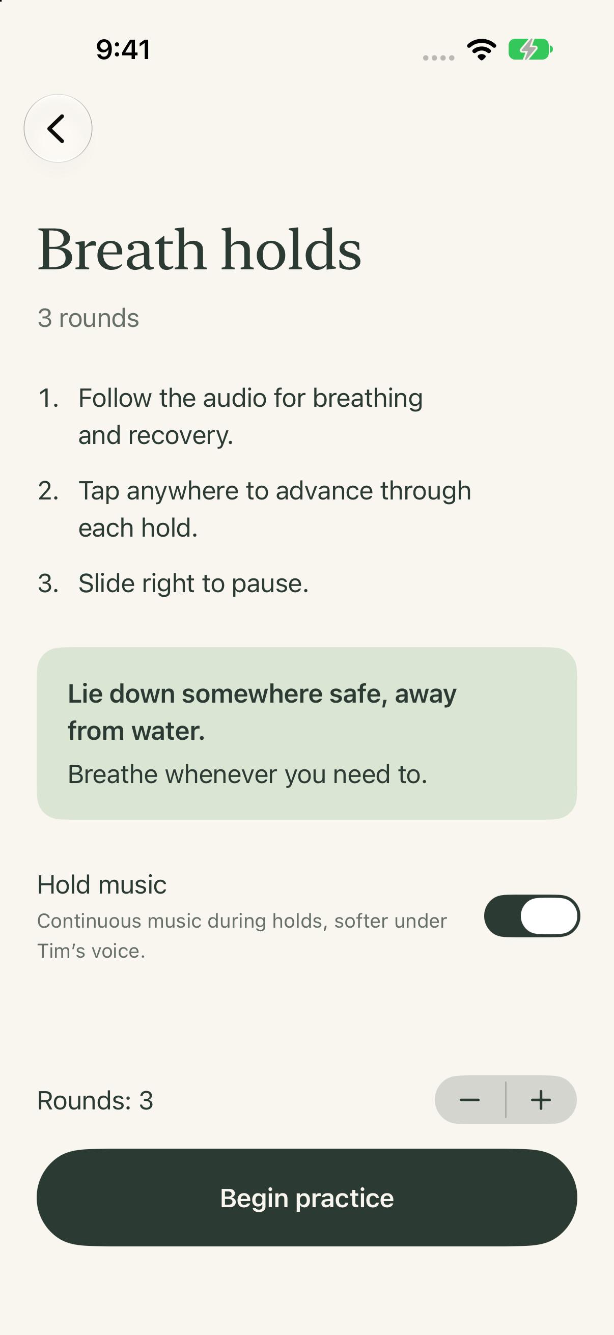 Breath-hold setup in the iPhone app, with a round selector, optional hold music, and a Begin practice button.